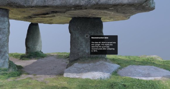 Screenshot of a 3D model of Lanyon Quoit showing an annotation illustrating the hard-to-see reconstruction date carved into the monument. Three upright stones support a huge granite capstone. One of the upright stones has the numeral 1 (coloured white) in a circle of contrasting colour (black). When clicked, as shown here, a black box with white text reads "Reconstruction date - The date AD 1824 is carved into this upright. This marks the date that the quoit was reconstructed after collapsing in 1815".